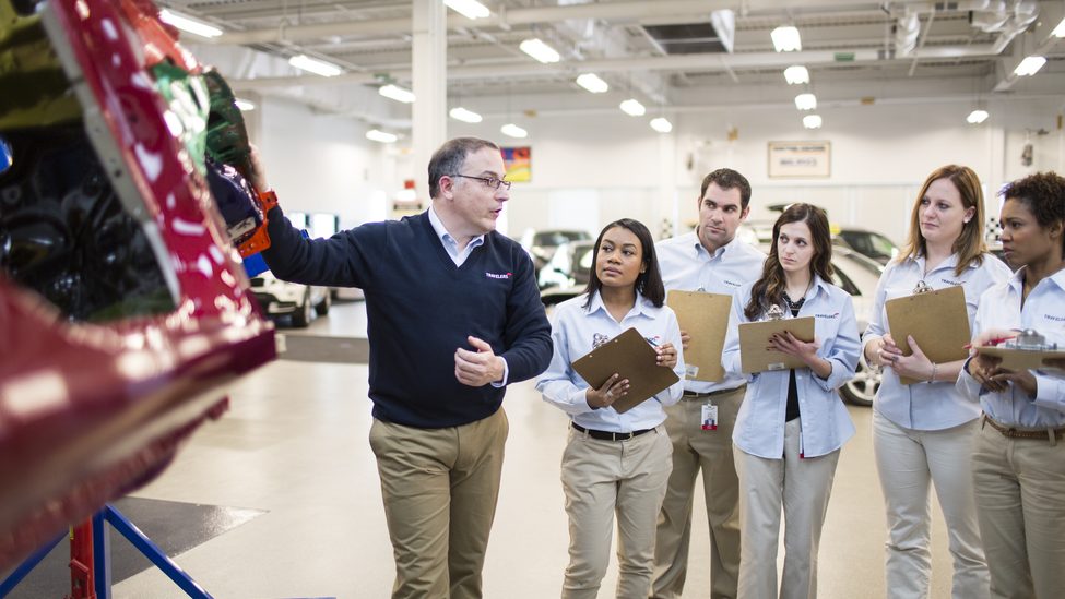 Travelers’ employees listen to an instructor at Travelers Claim University.