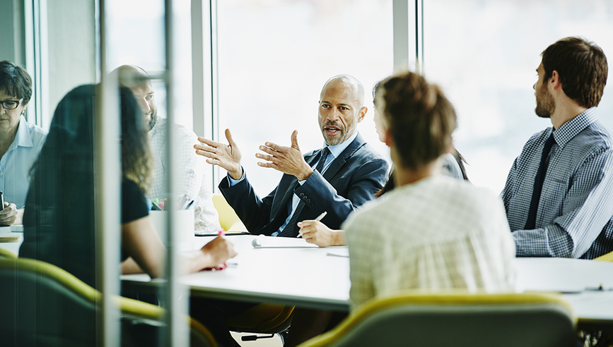 Business people having a meeting in an office building.