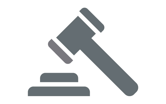 gray icon of a gavel