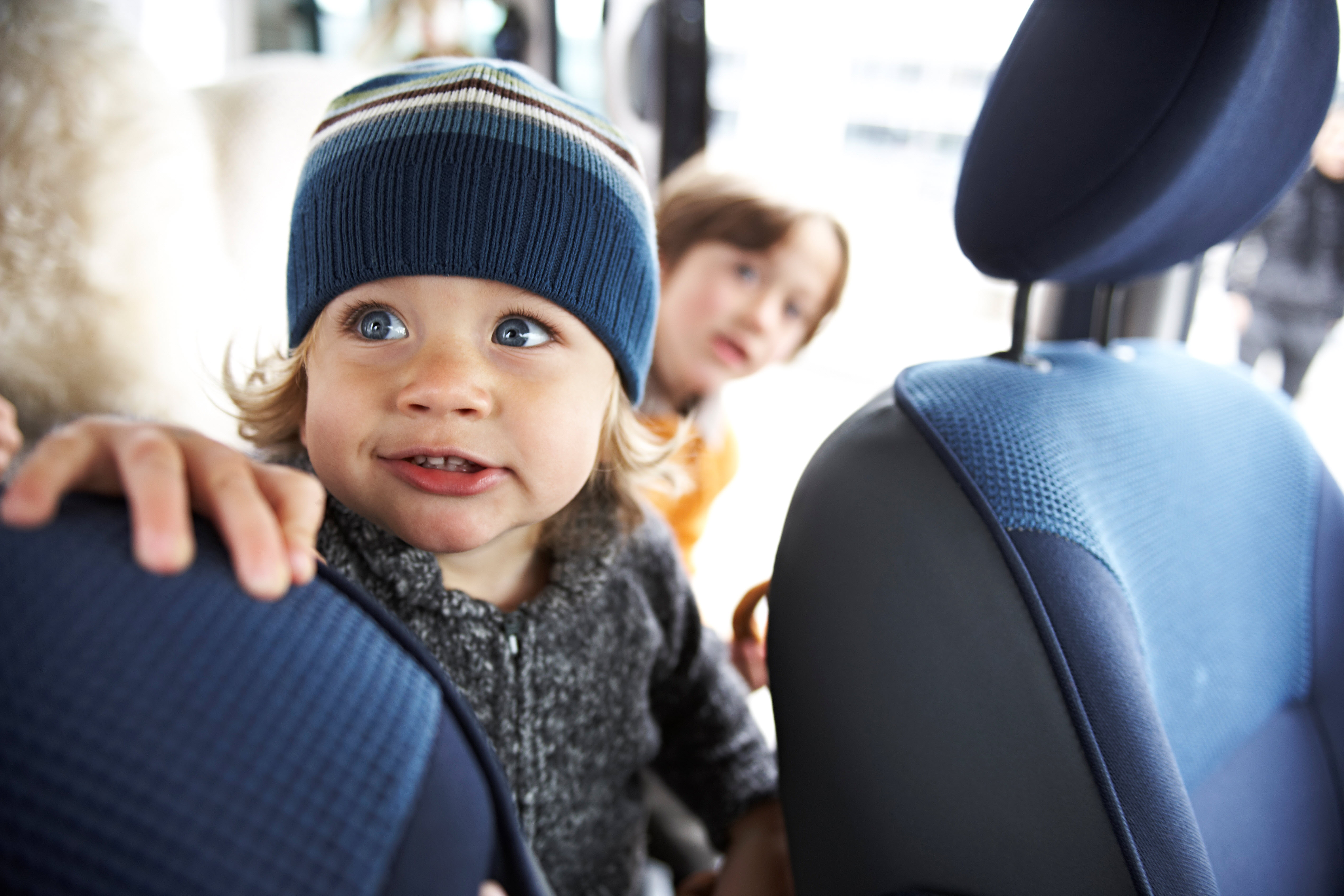 Baby-wearing-beanie-in-backseat