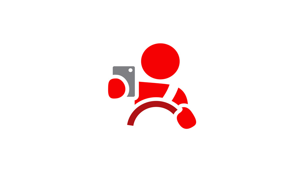 red and grey icon illustrated icon of a person driving and looking at their phone