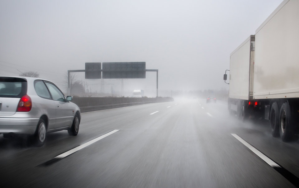 cars driving on windy road