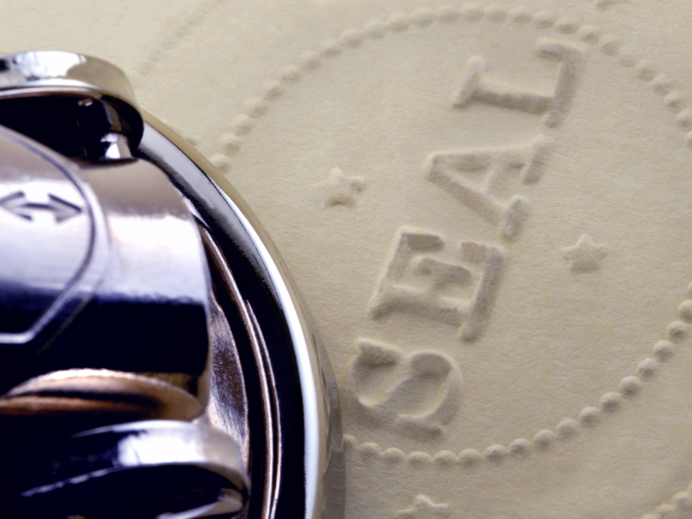 close up of a seal on a paper