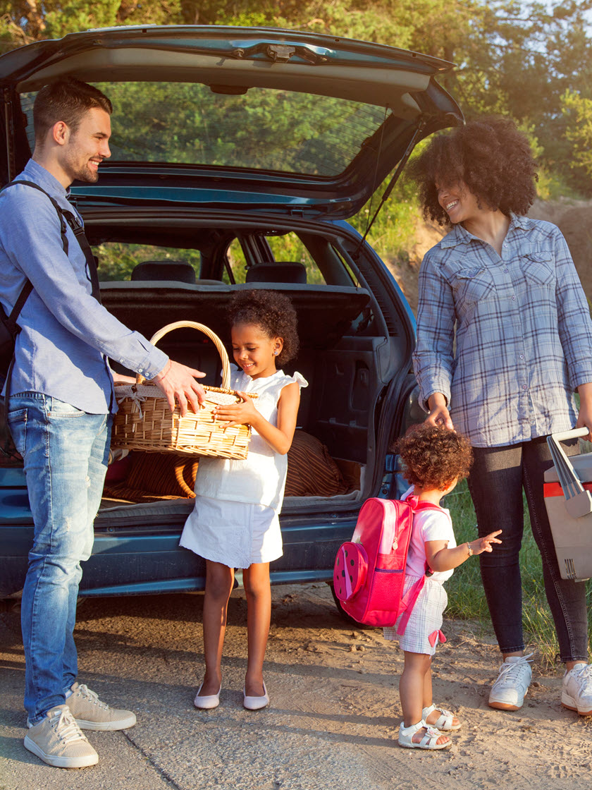 family-picnic-outside-trunk