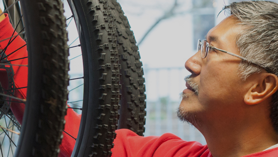 A closeup of bicycle tires.