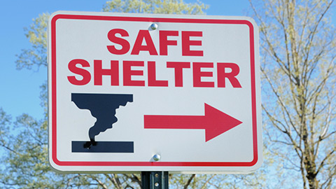 Seek shelter sign for what to do in a tornado.