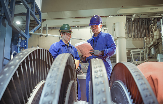 Two men working in industry 