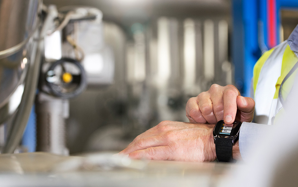 Man using smart watch.