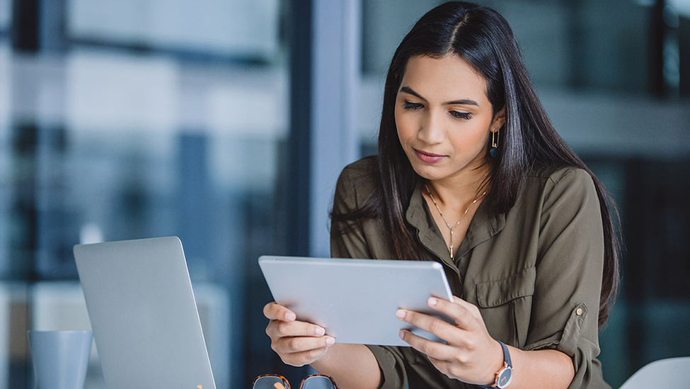 Woman Digitizing Insurance Agency Operations.