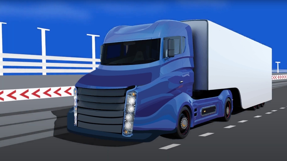 Blue trucking driving down road