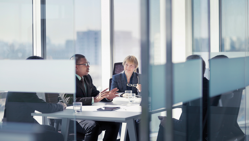 business-professionals-having-meeting-around-table-at-office.jpg