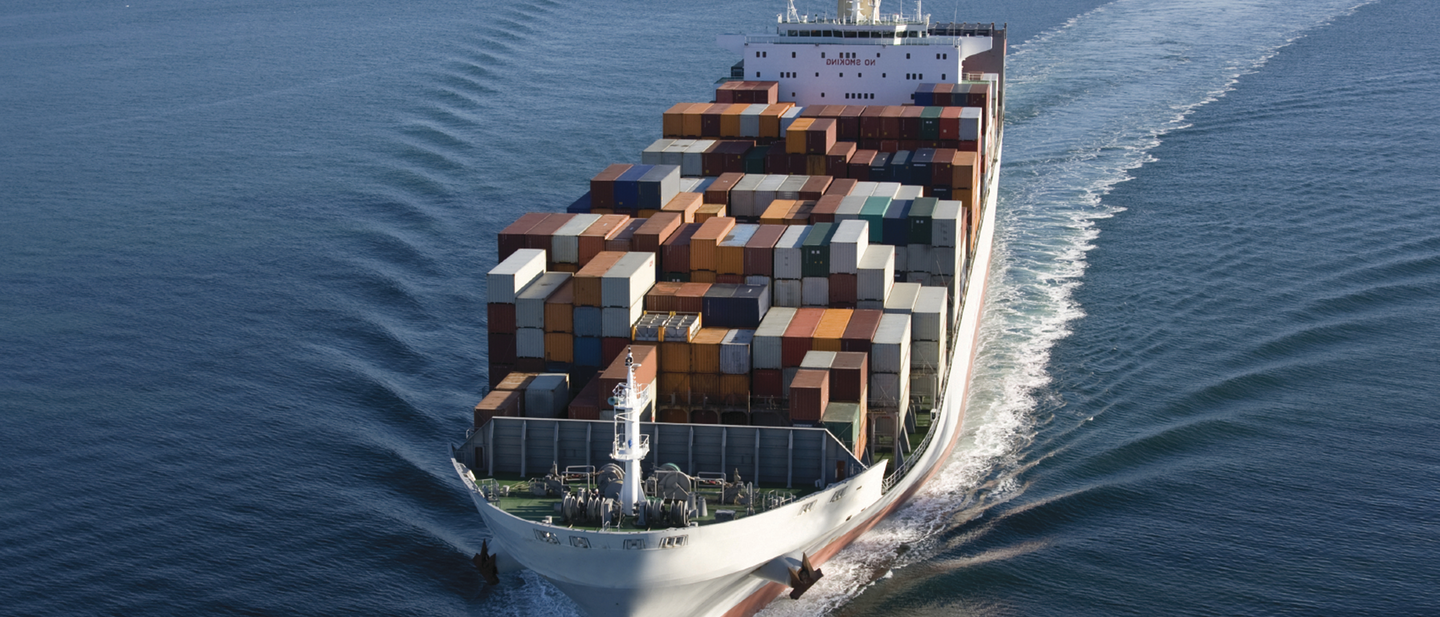 Cargo ship in transit on the ocean.