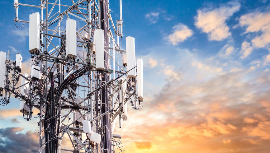 5G Sunset Cell Tower: Cellular communications tower for mobile phone and video data transmission