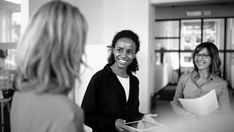 Woman meeting with loss consultant to determine whether to file a claim.