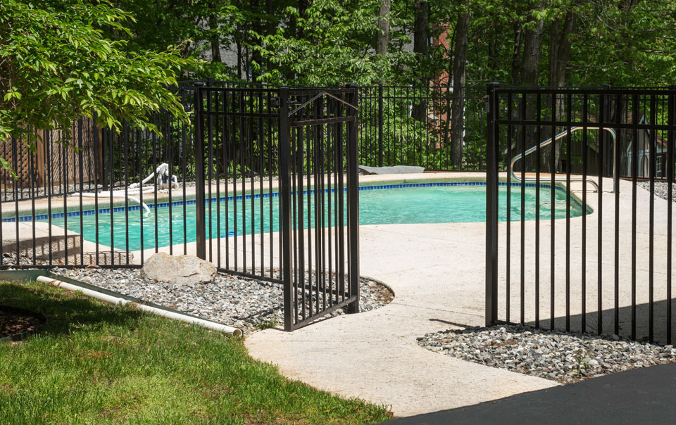 fence around a pool area.