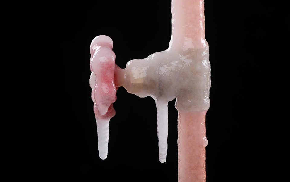 Close-up of frozen pipes.