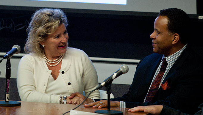 Travelers Institute President Joan Woodward, USC Clinical Associate Professor Christopher Holmes Smith