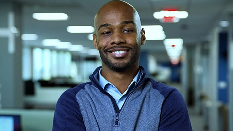 A headshot of a Travelers employee, Jason.