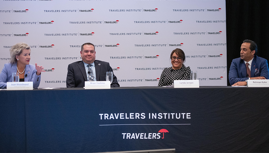 Joan Woodward and other speakers on a cyber panel