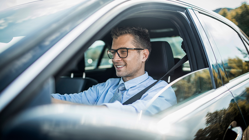 Employee driving a car