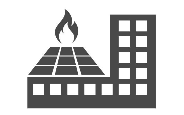Black and white icon of a building with fire.