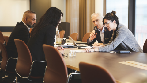 employees having meeting in the office.