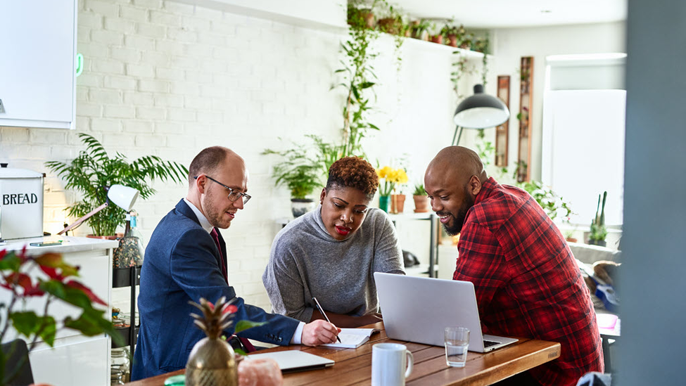 Employees making a business plan.