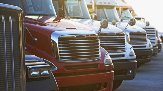 Semi-trucks in a row.