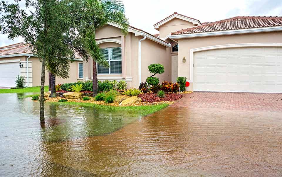 Flood damage outside a home.