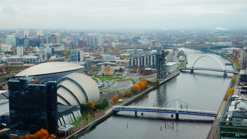 An aerial view of the city of Glasgow, Scotland, including the River Clyde.