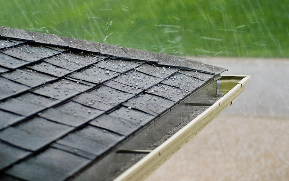 Hail hitting roof of home.