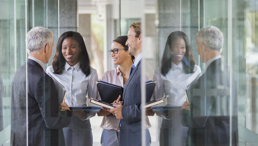 Business people talking in office building