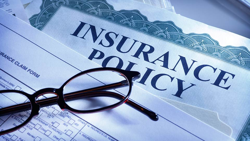 Picture of insurance policy documents.