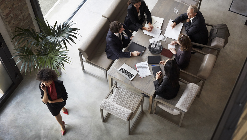 Lawyers having a meeting in a conference room.