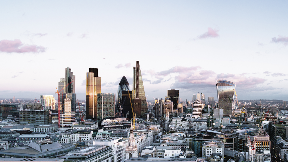 Elevated view over London City skyline at sunset