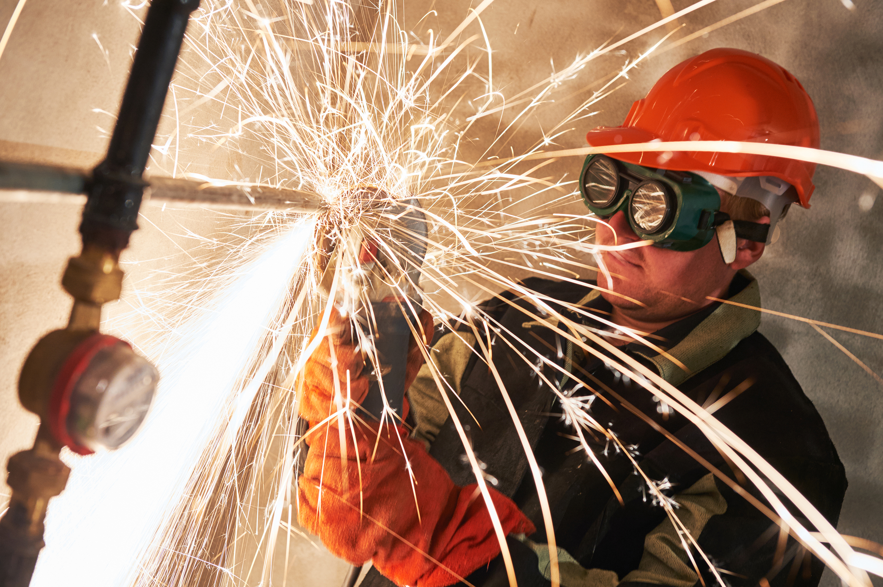 Man performing hotwork.