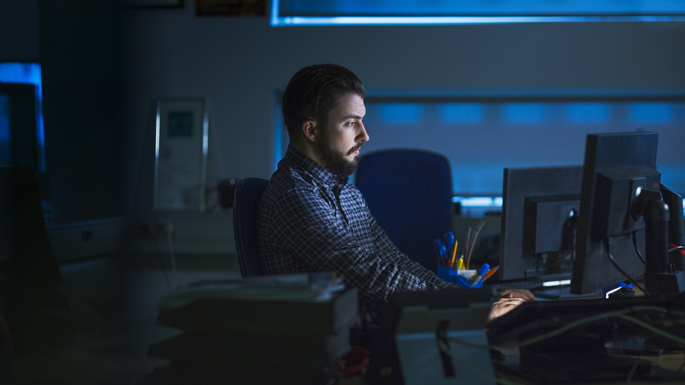 Businessman working late in office