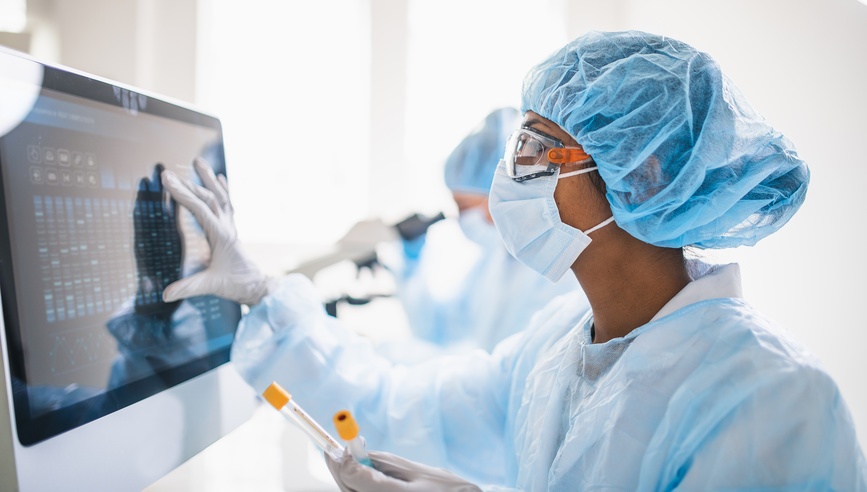 Medical professional using a touchscreen computer