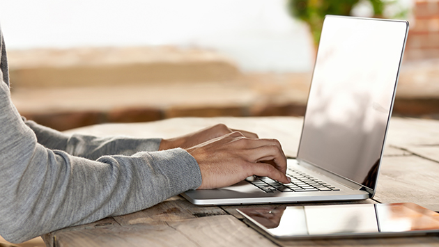 Person working on a laptop.