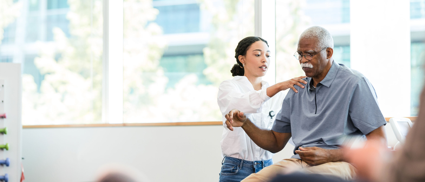 Patient receiving physical therapy treatment from physical therapist.