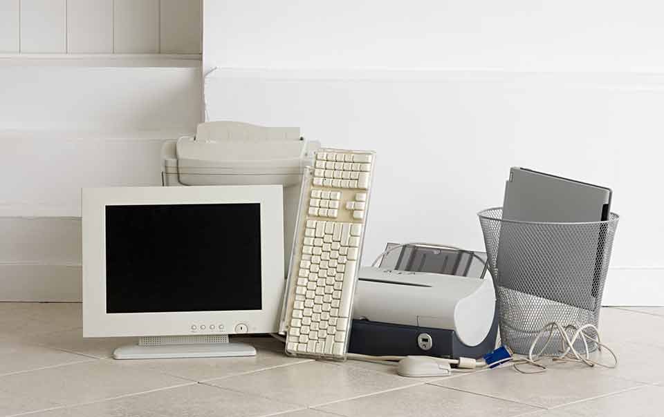 Pile of old computers can be considered e-waste.
