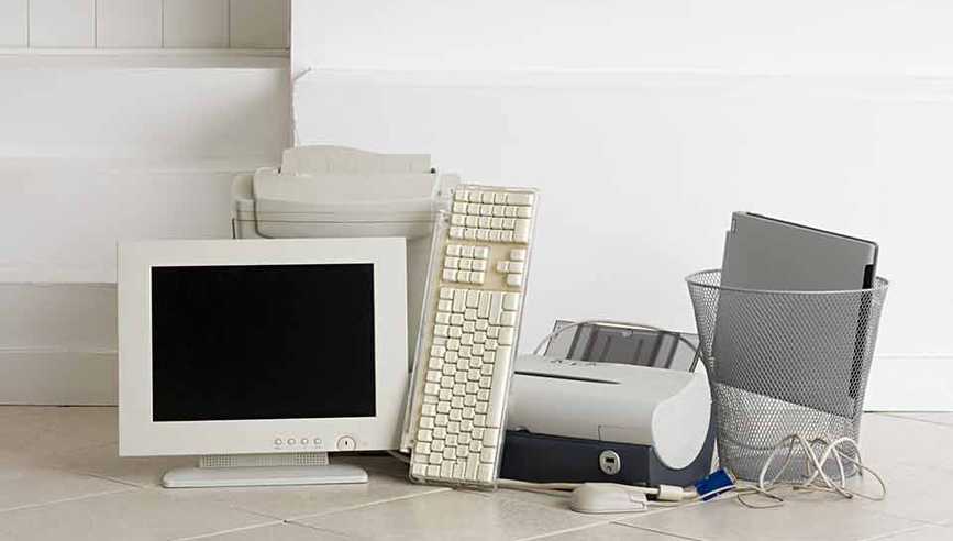 Pile of old computers can be considered e-waste.