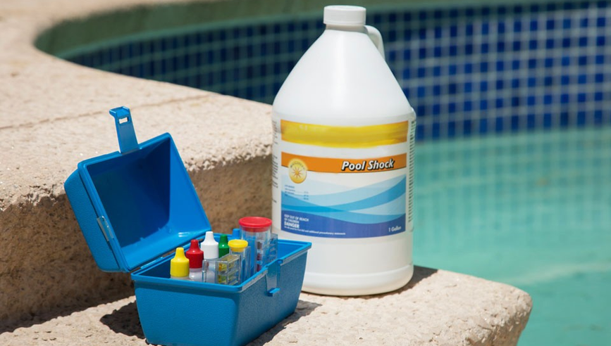 pool chemicals on the side of a pool