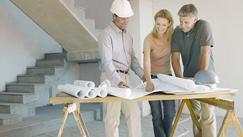 Architect showing map to the customer.