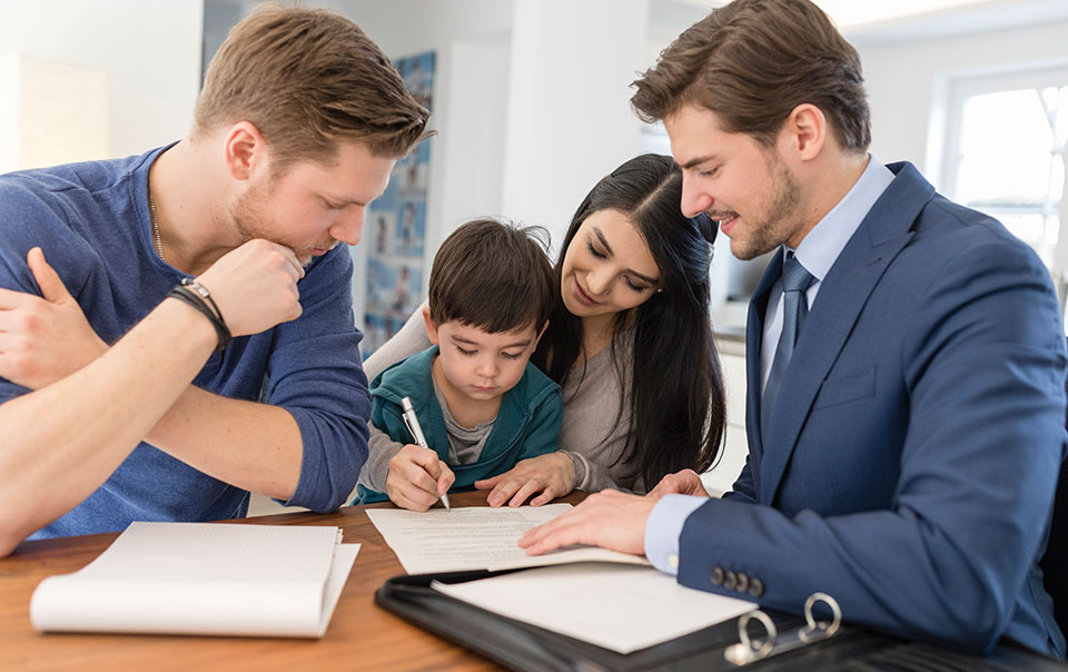 Family meeting with agent at table