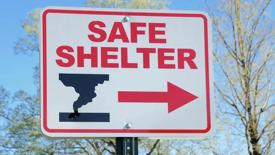 Safe shelter sign for tornado protection.