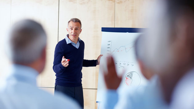 Man teaching a class.