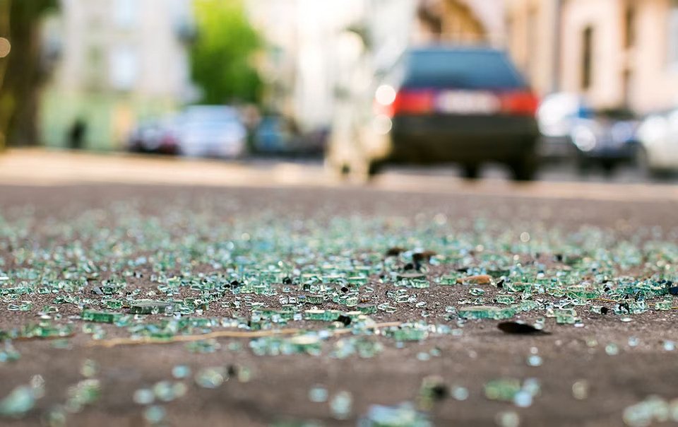 Broken glass on road after a car accident