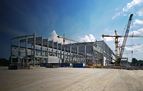 Large cranes in a construction site.