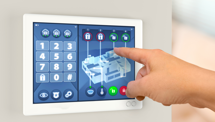 Smart home automation: wall display showing house alarm security system with secret code number keypad and apartment map with sensors and lock status. Hands pointing at touch display, digiting code.